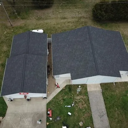 Slide of Epic Builders Roofing