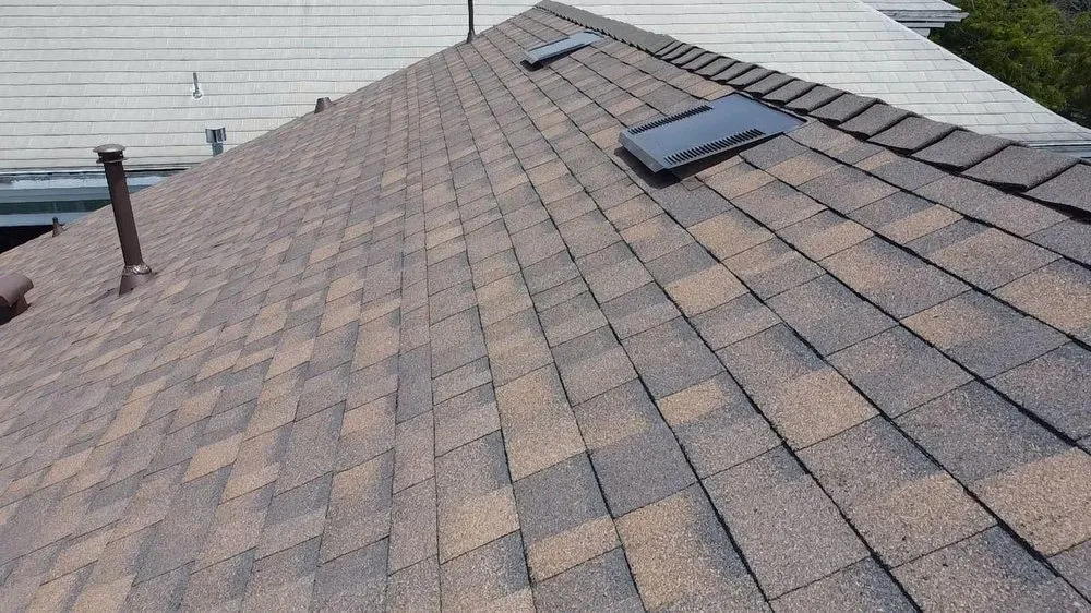 Slide of Equinox Roofing