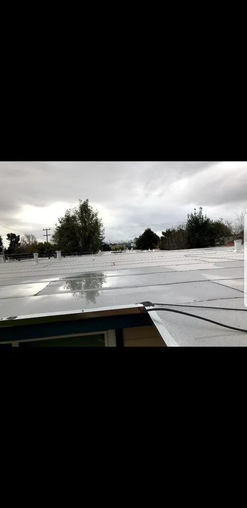 Slide of Equinox Roofing