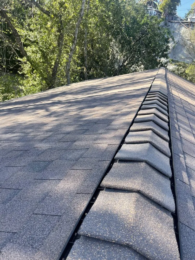 Slide of Equinox Roofing