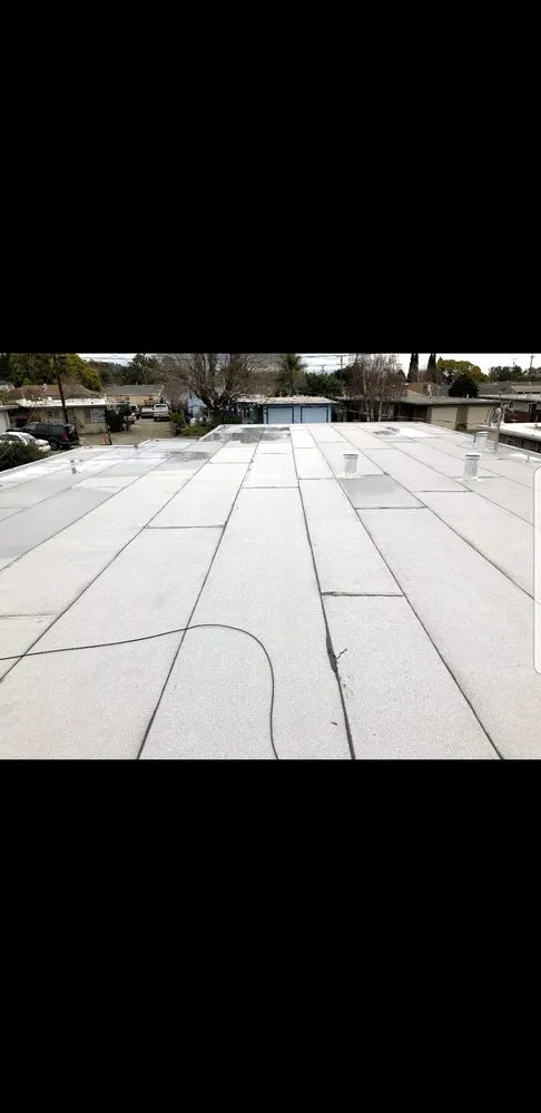 Slide of Equinox Roofing