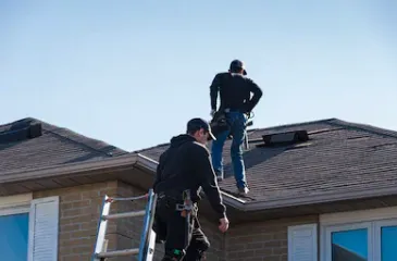 Professional storm damage roof repair experts serving Old Town Manassas, VA - Er & Af Amigo