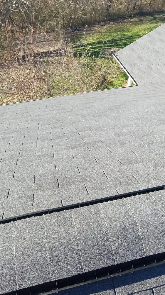 Slide of E&R Roofing & More