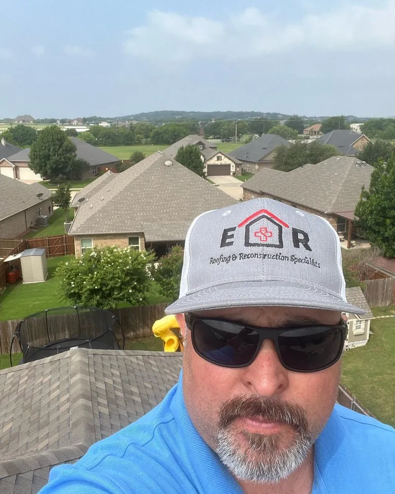 Slide of ER Roofing & Reconstruction