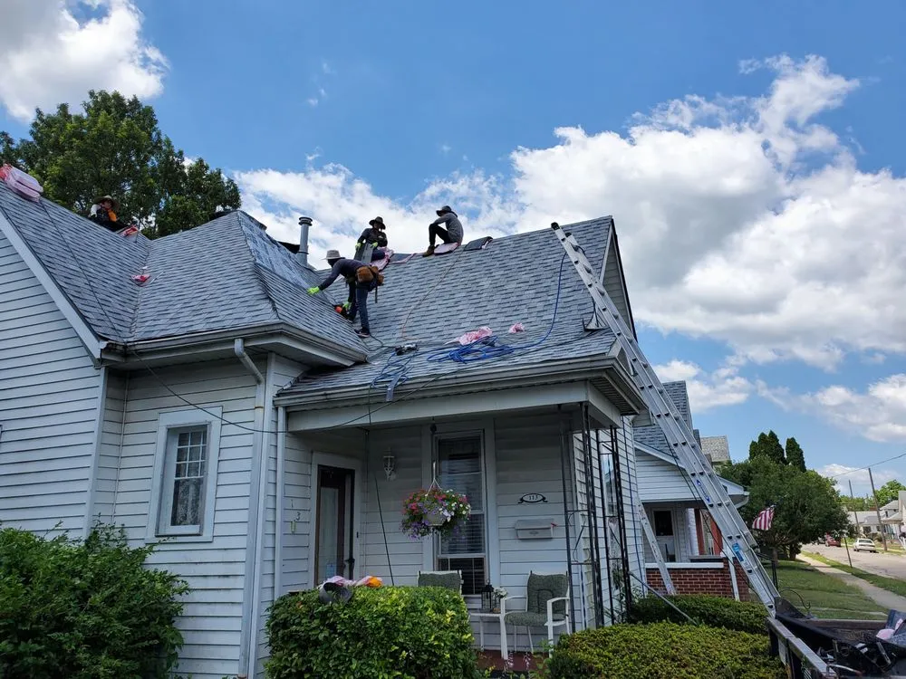 Slide of ER Roofing And Cleaning