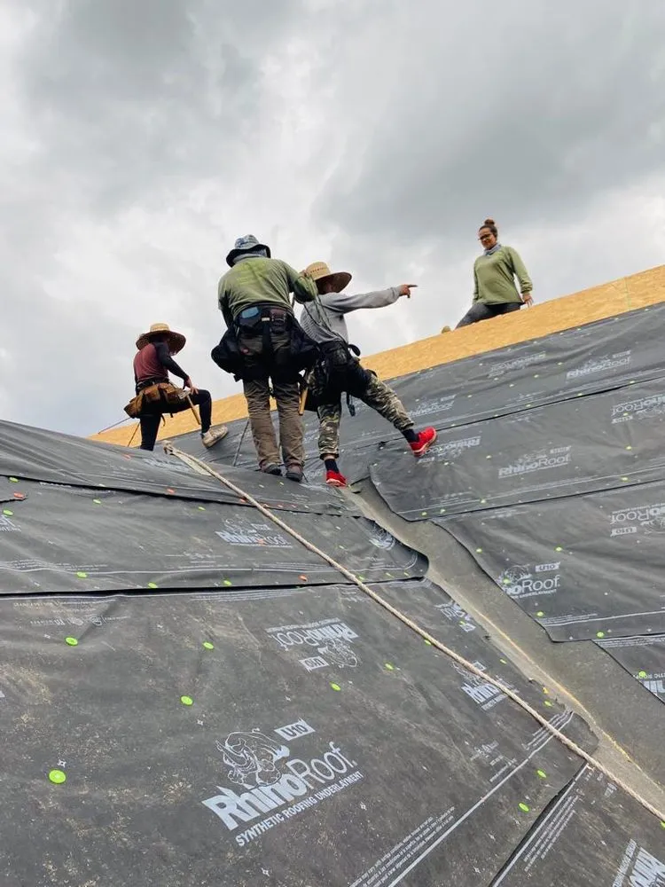 Slide of ER Roofing And Cleaning