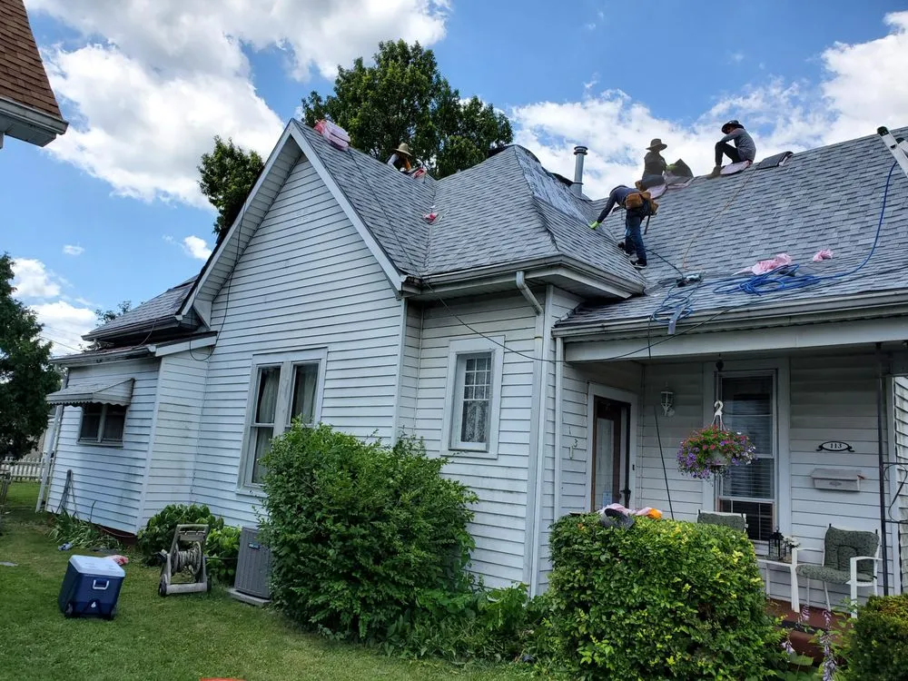 Slide of ER Roofing And Cleaning