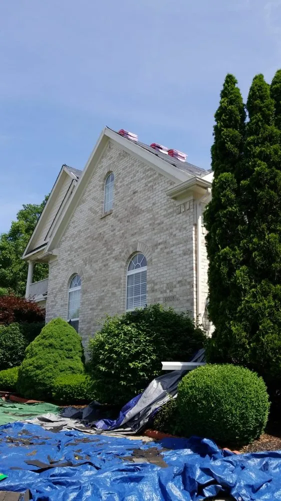 Slide of ER Roofing And Cleaning