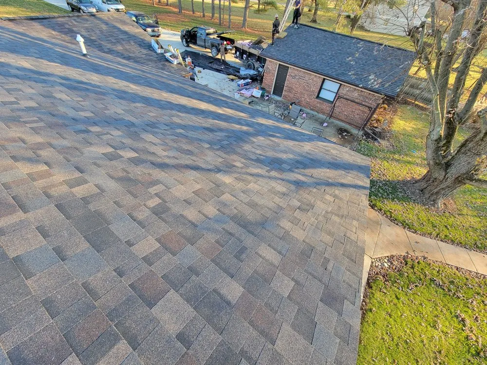 Slide of ER Roofing And Cleaning