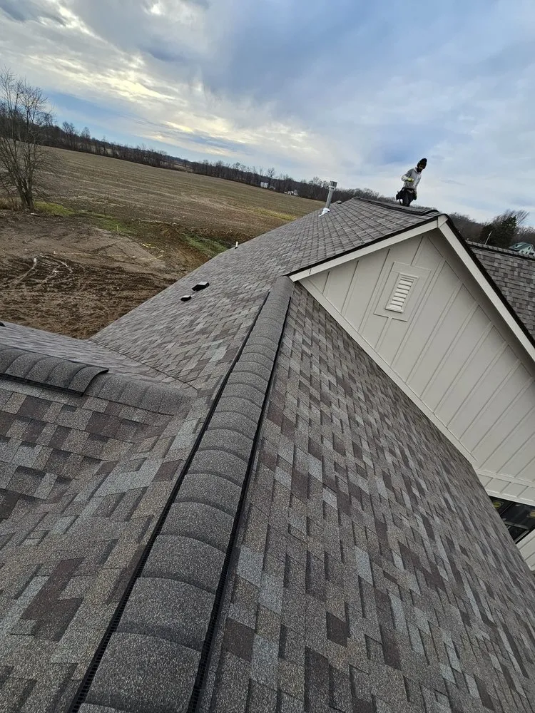 Slide of ER Roofing And Cleaning