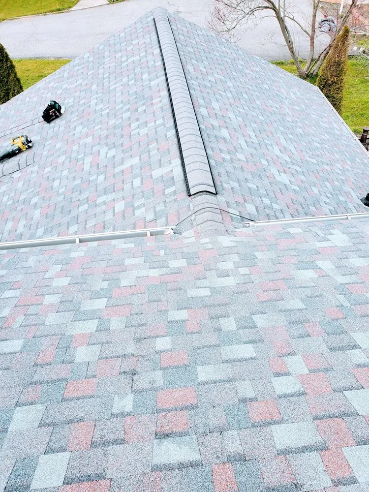 Slide of ER Roofing And Cleaning