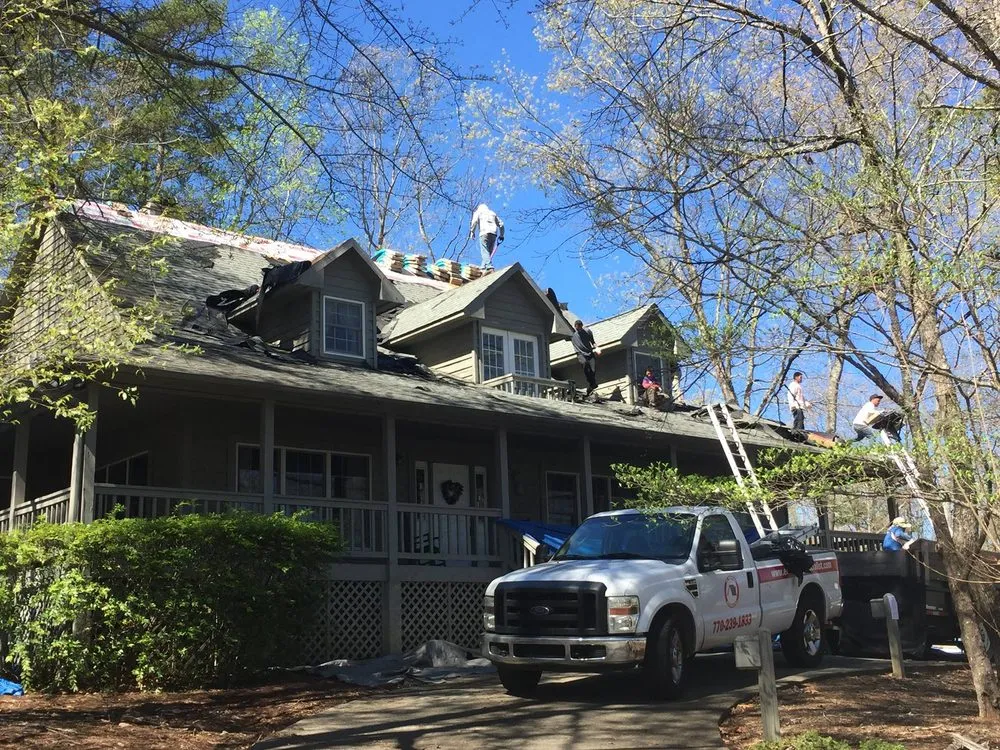 Slide of ER Roofing Specialist