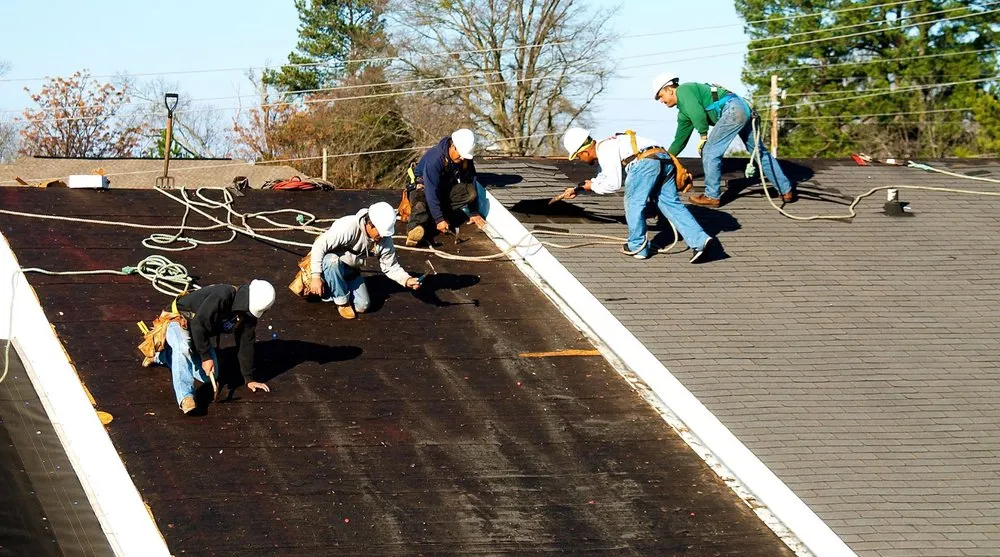 Slide of ERC Roofing and Construction