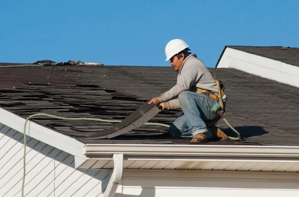 Slide of ERC Roofing and Construction