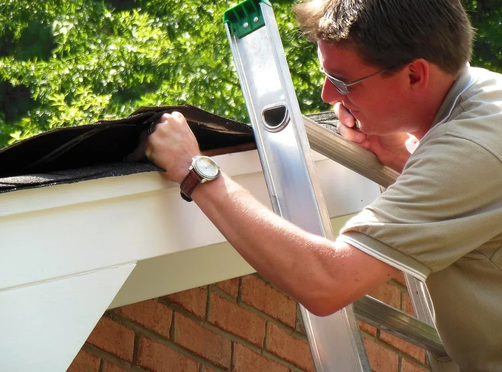 Slide of ERC Roofing and Construction