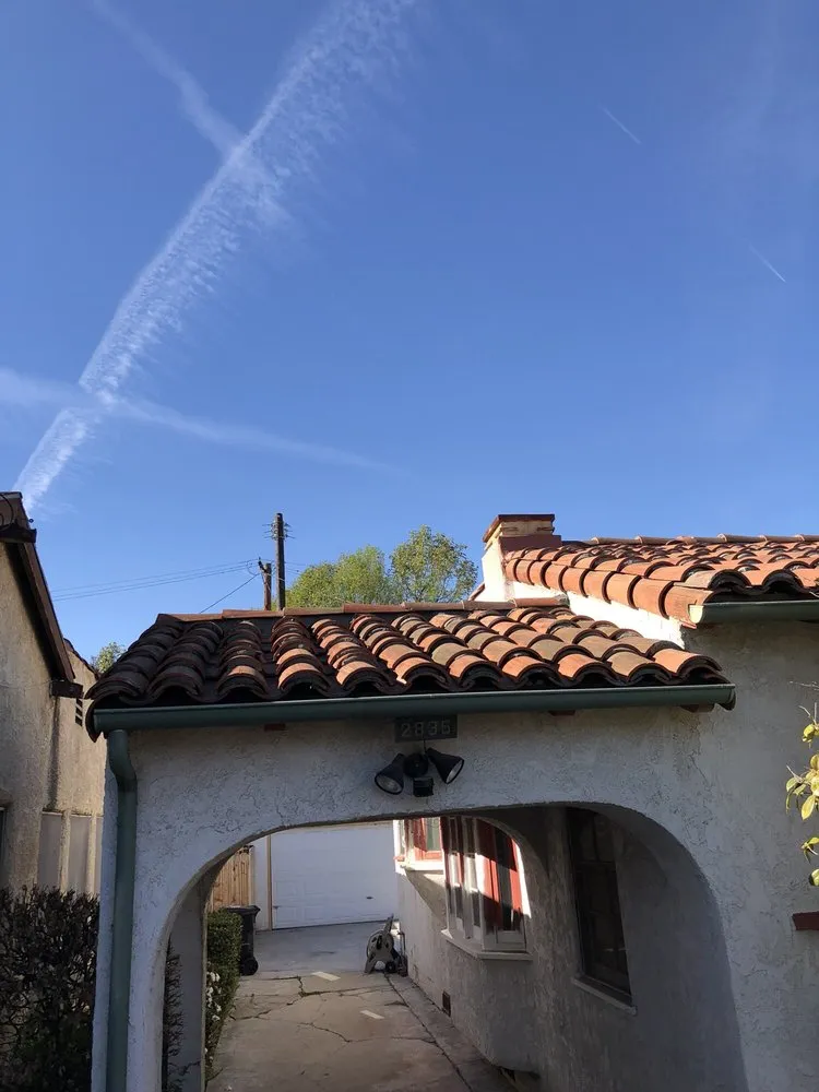 Slide of Eric's Roofing