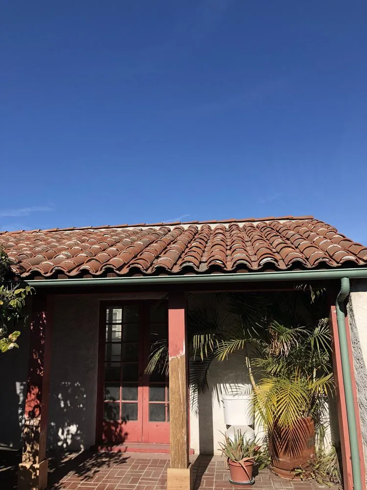 Slide of Eric's Roofing