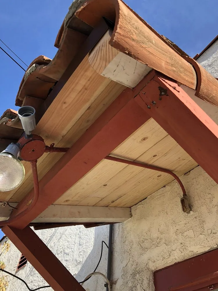 Slide of Eric's Roofing