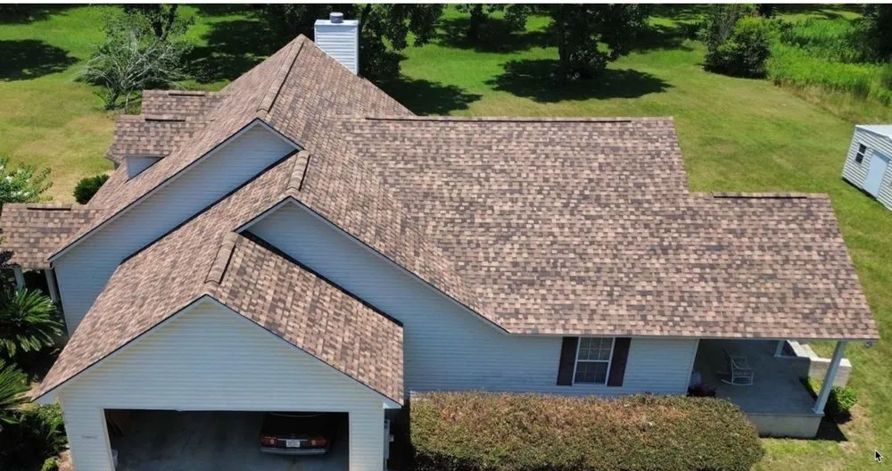 Slide of Erie Roofing