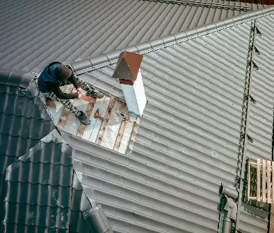 Slide of Erie Roofing