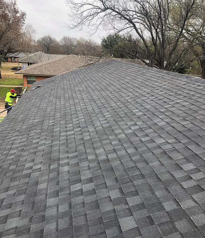 Slide of Erik's Roofing