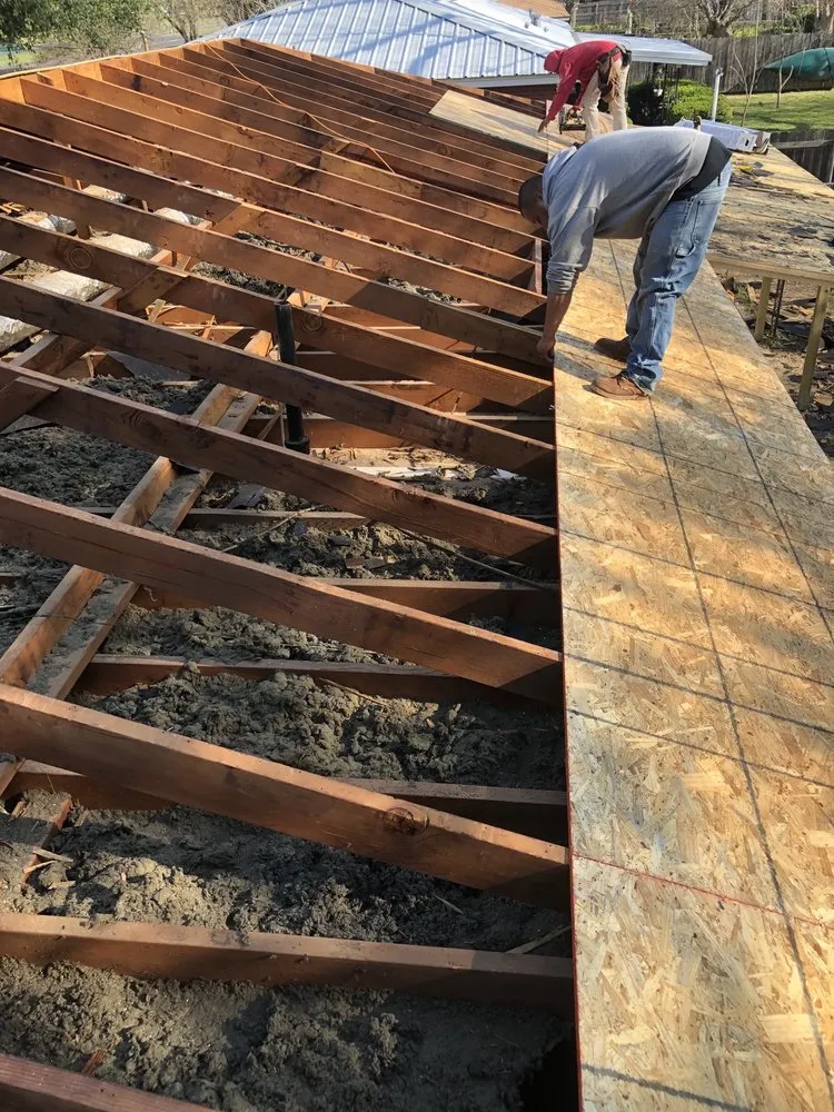 Slide of Erik's Roofing