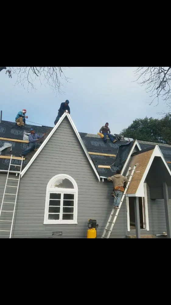Slide of Erik's Roofing