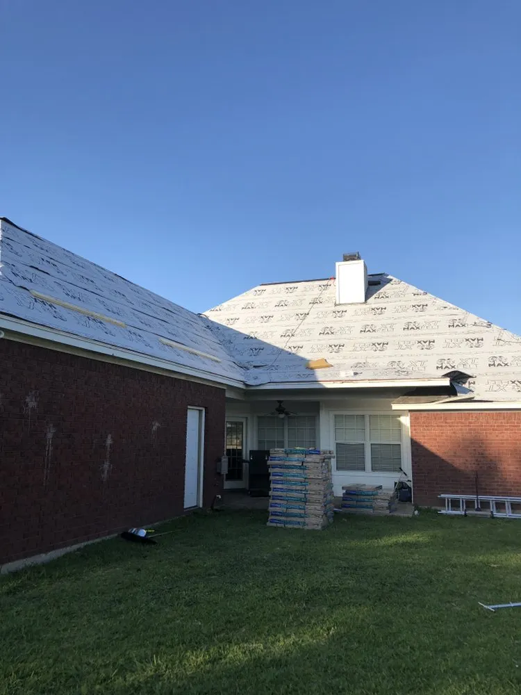 Slide of Erik's Roofing