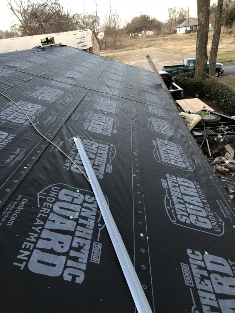 Slide of Erik's Roofing