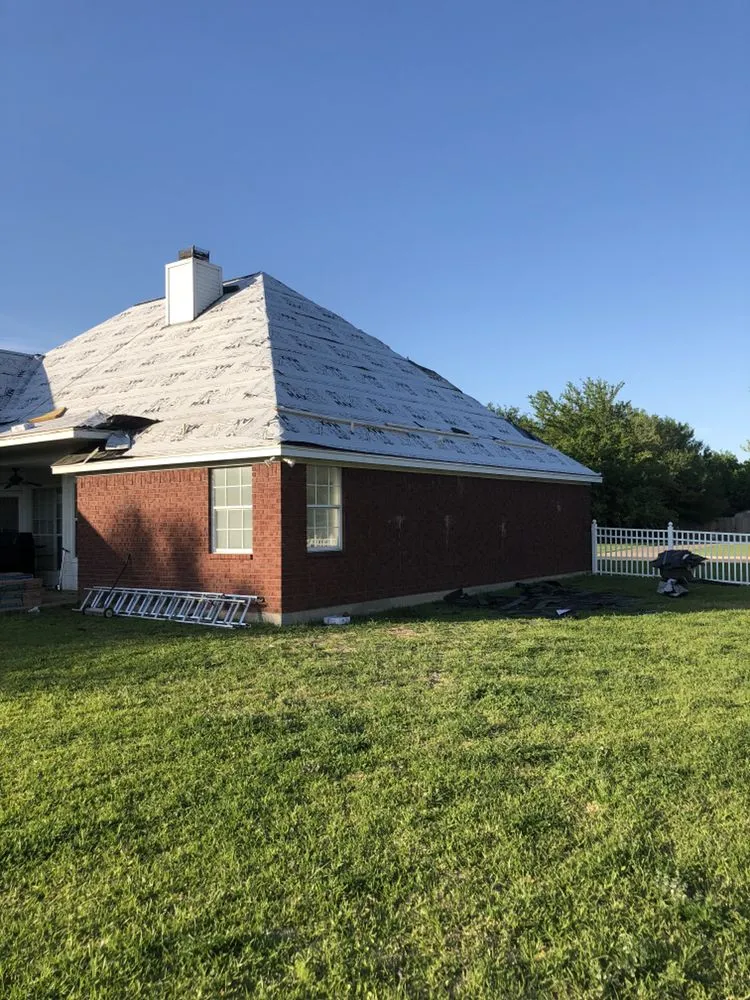 Slide of Erik's Roofing