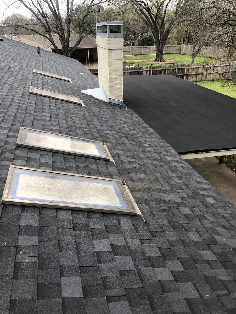 Slide of Erik's Roofing