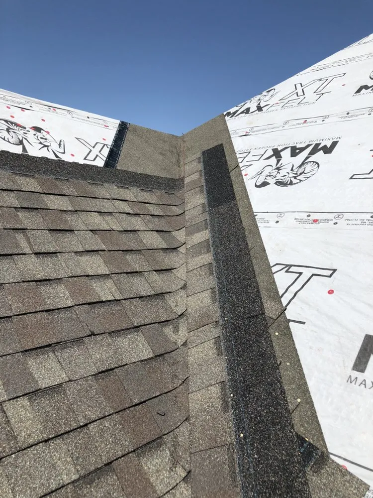 Slide of Erik's Roofing