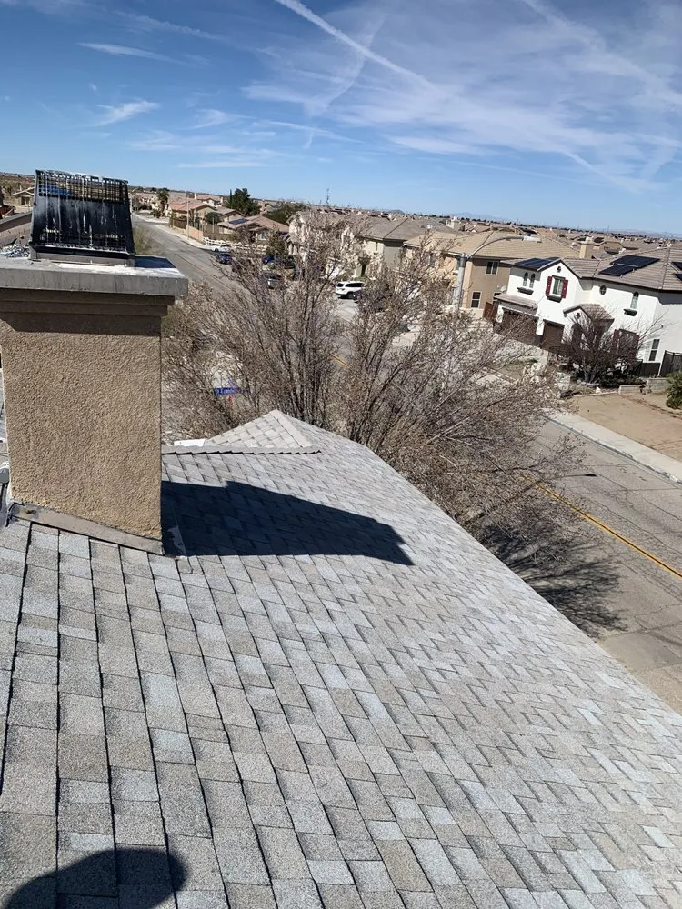 Slide of Ernestos Roofing