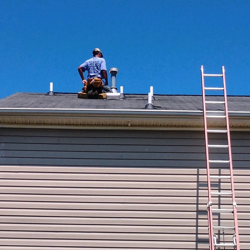 Slide of ES Roofing & Gutters