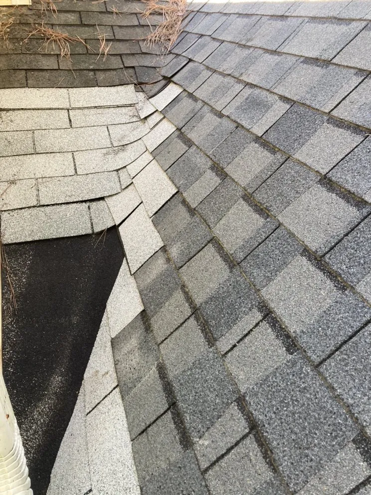 Slide of ES Roofing & Gutters