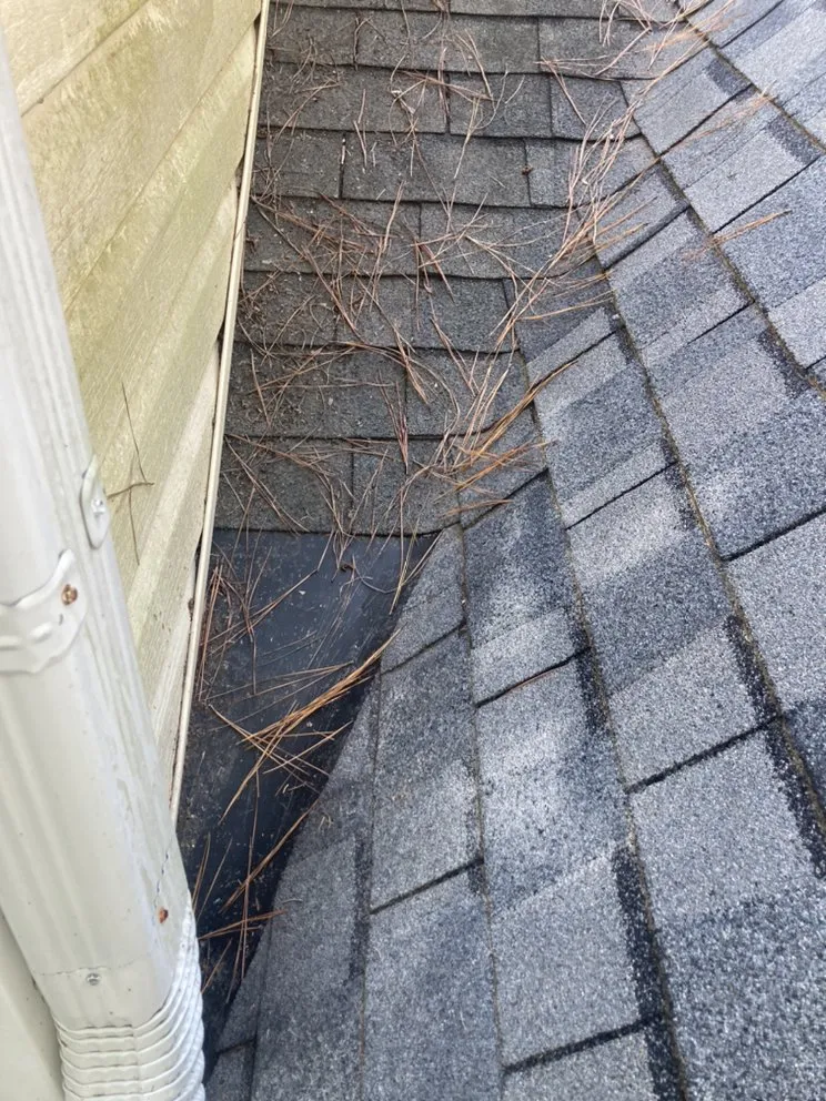 Slide of ES Roofing & Gutters