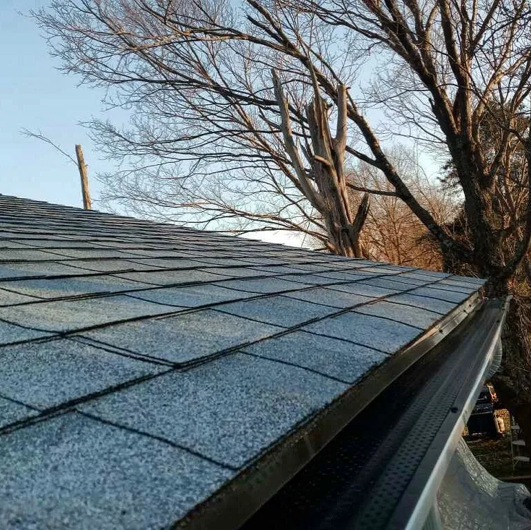 Slide of ES Roofing & Gutters