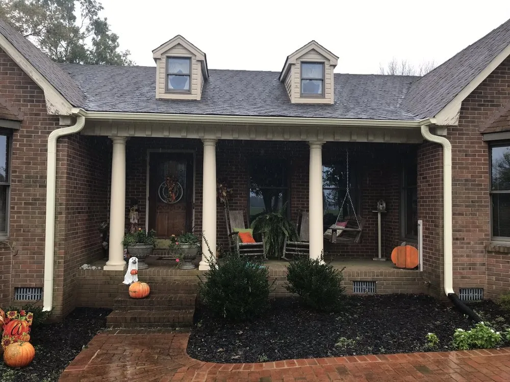 Slide of ES Roofing & Gutters