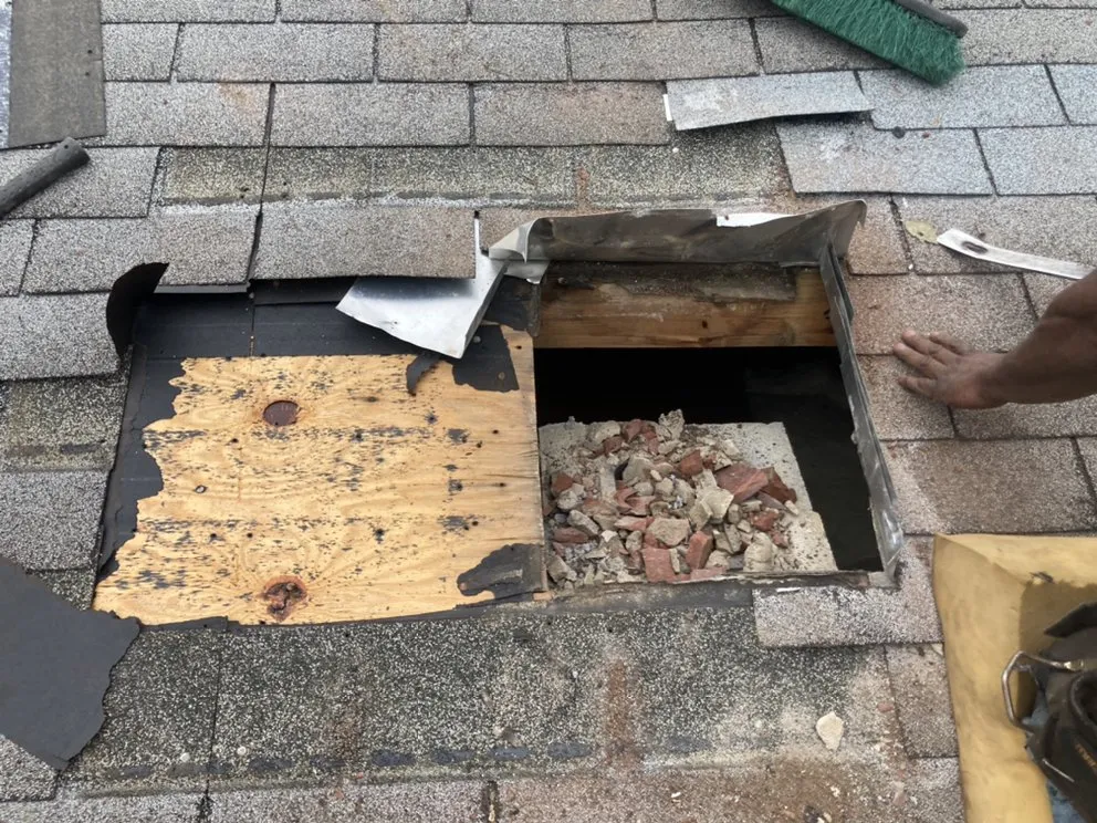 Slide of ES Roofing & Gutters