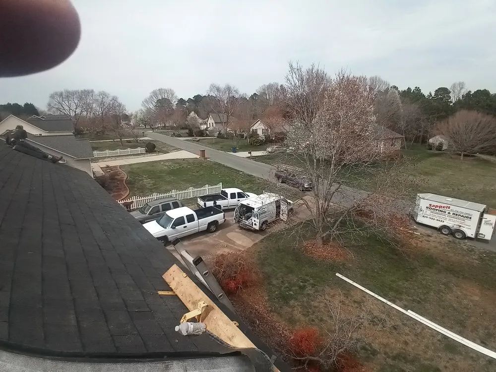 Slide of ES Roofing & Gutters