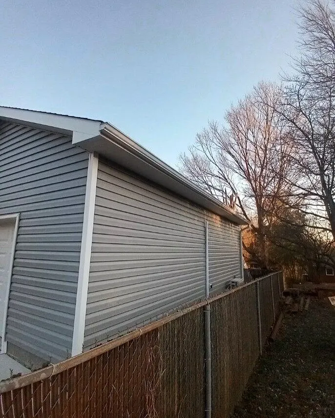 Slide of ES Roofing & Gutters