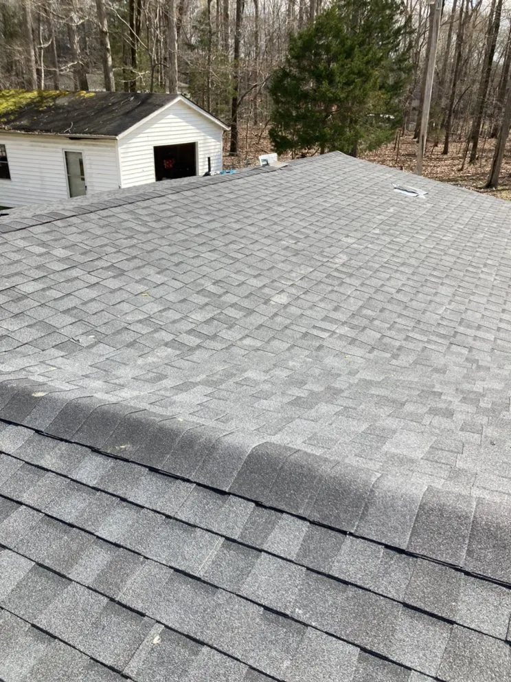 Slide of ES Roofing & Gutters