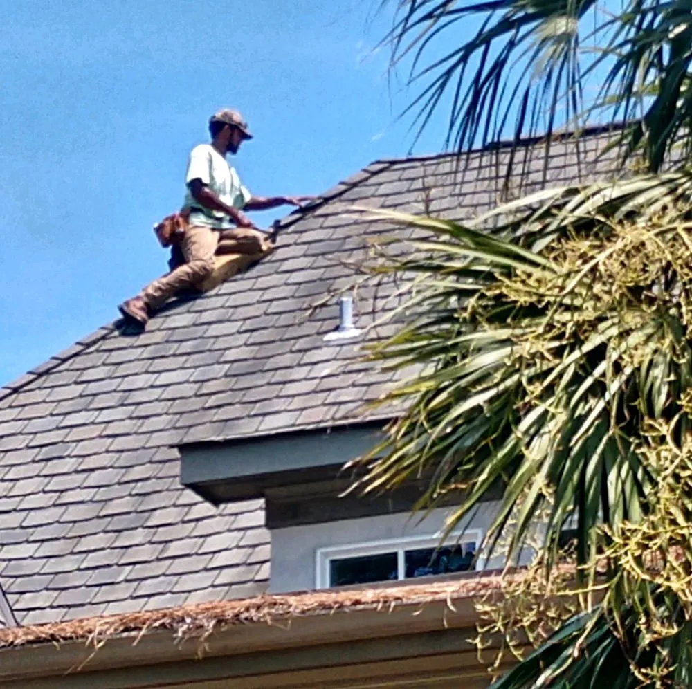 Slide of ES Roofing & Gutters