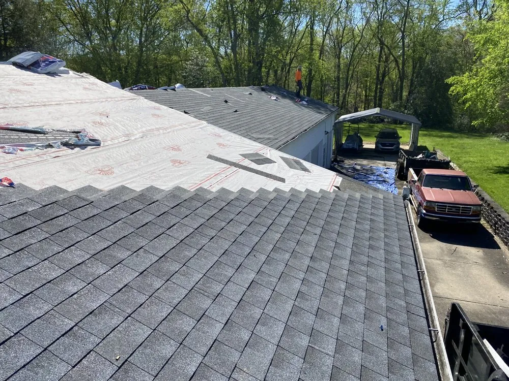 Slide of Escalante Roofing