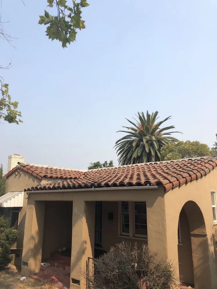 Slide of Escalante Roofing