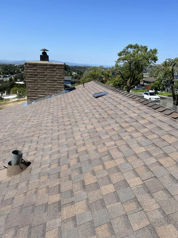Slide of Escalante Roofing