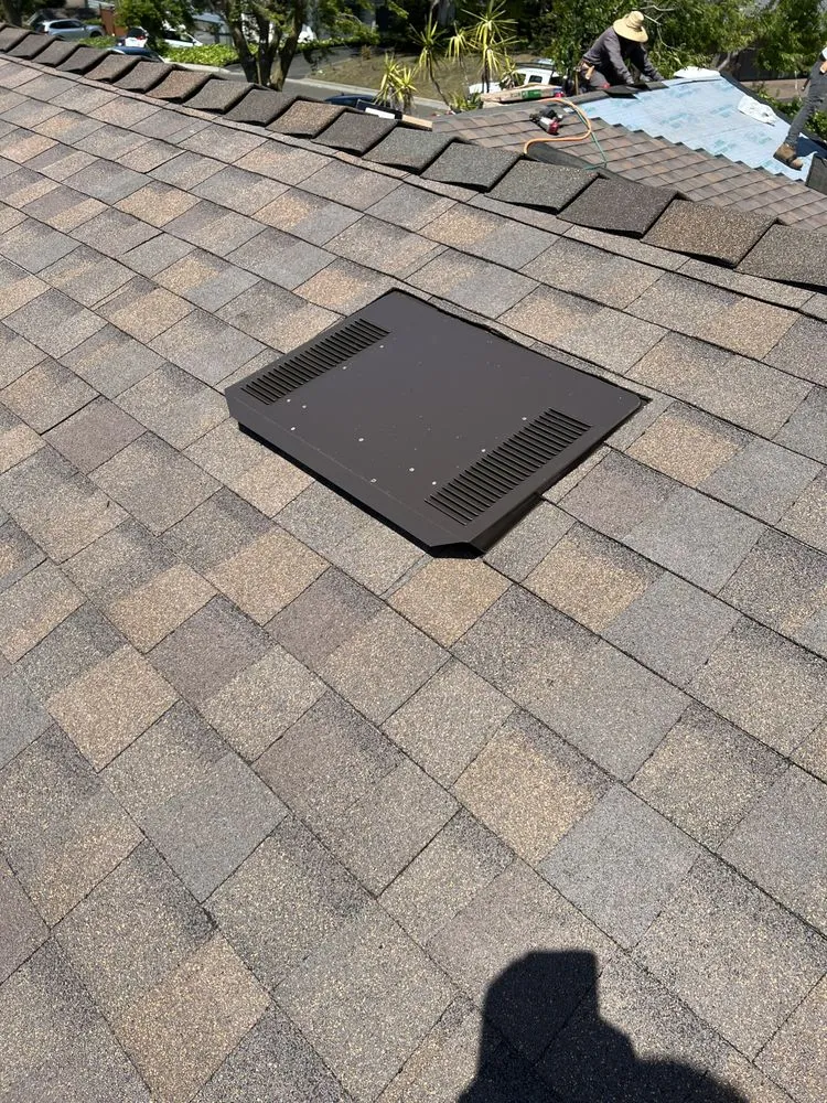 Slide of Escalante Roofing