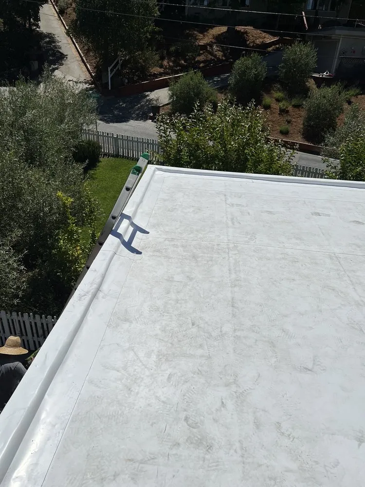 Slide of Escalante Roofing