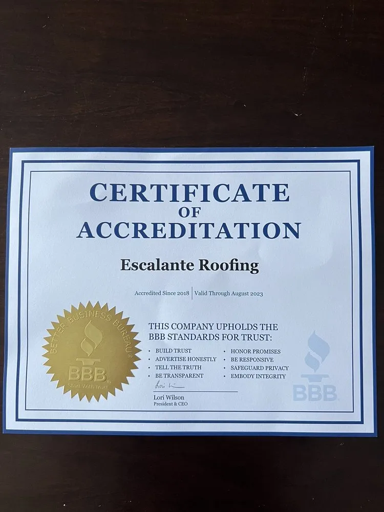 Slide of Escalante Roofing