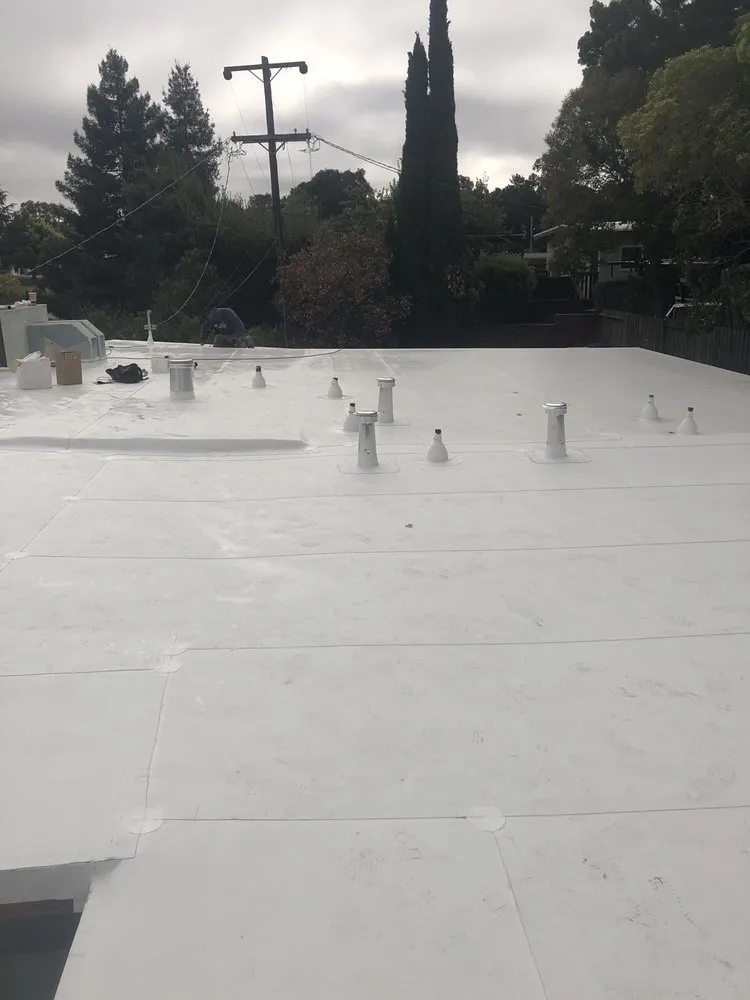 Slide of Escalante Roofing